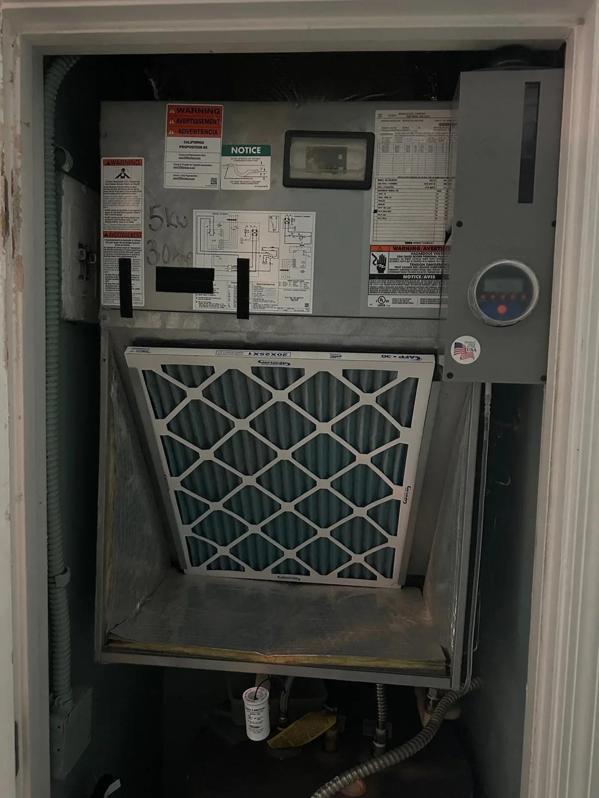 Conde-CLEAN mounted inside a condominium air handler closet